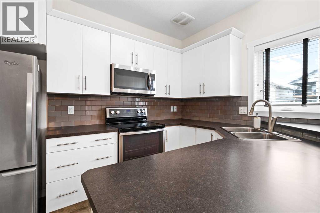 107 Henderson Crescent, Penhold, Alberta  T0M 1R0 - Photo 6 - A2349394