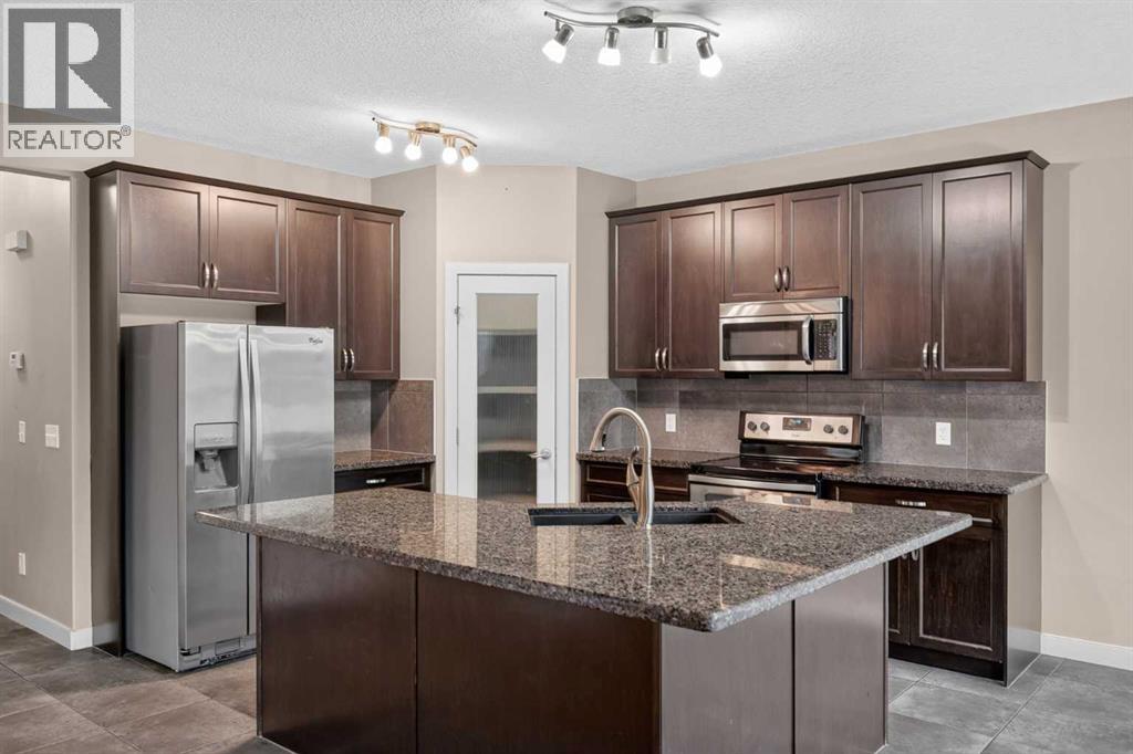 129 Everhollow Rise SW, Calgary, Alberta  T2Y 0B1 - Photo 4 - A2343067