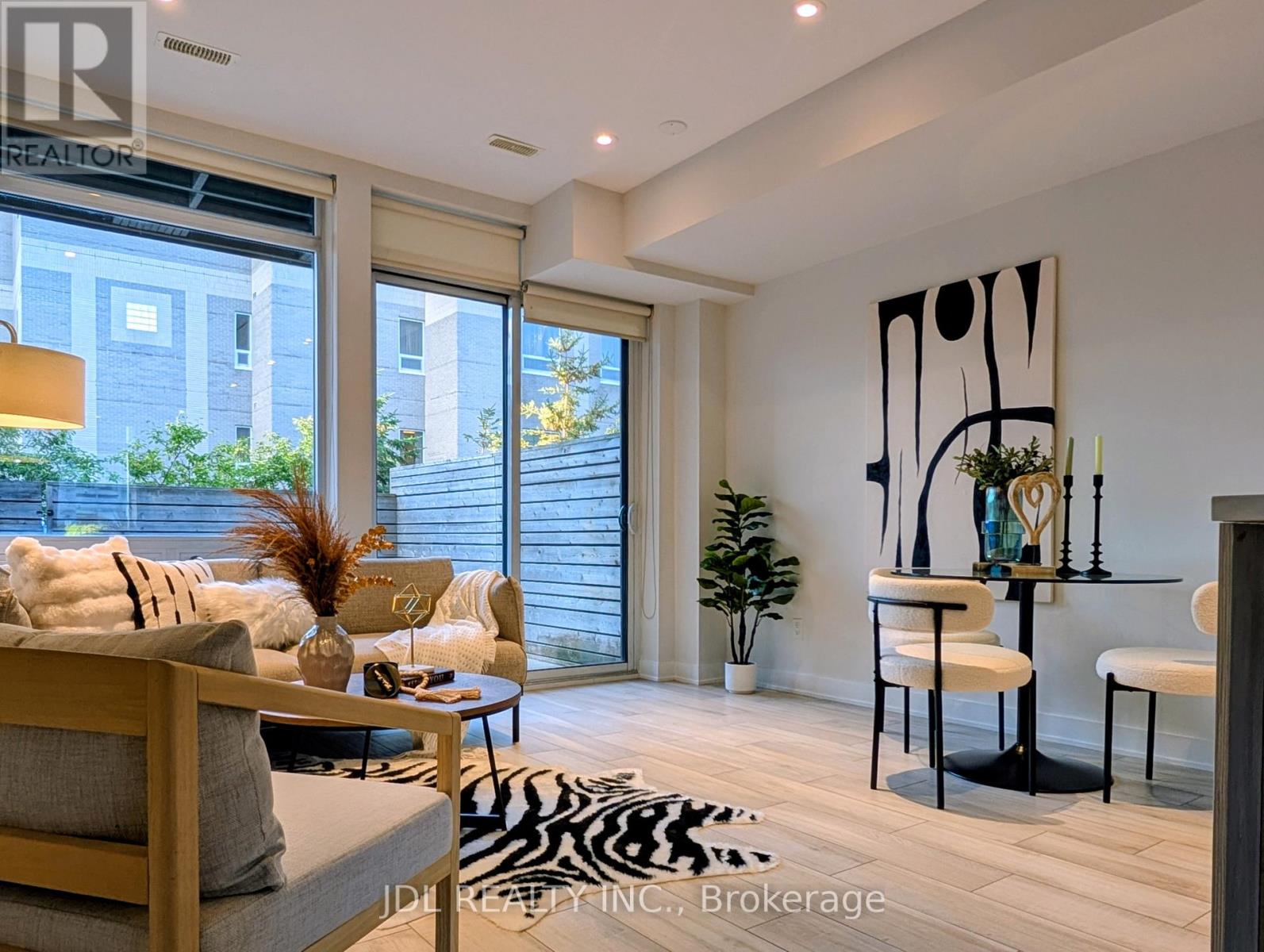 28 Sonic Way, Toronto, Ontario  M3C 3Z2 - Photo 3 - C13879032