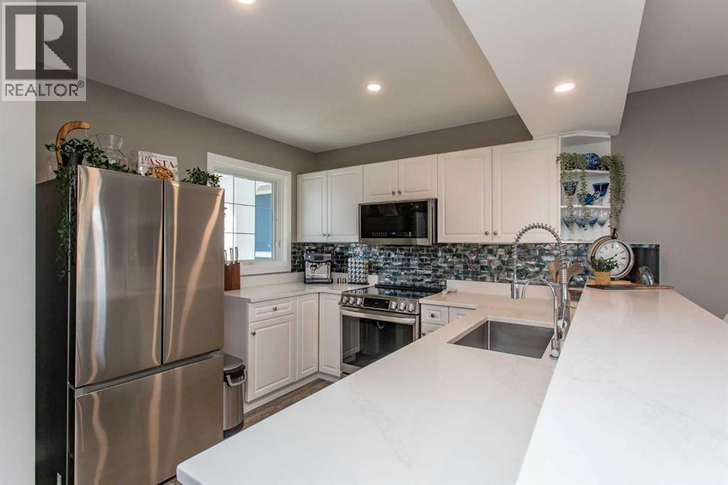 116 Marina Bay Court, Sylvan Lake, Alberta  T4S 1E9 - Photo 13 - A2348229