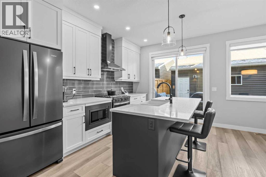 236 Rowmont Boulevard NW, Calgary, Alberta  T3L 0H3 - Photo 9 - A2348708