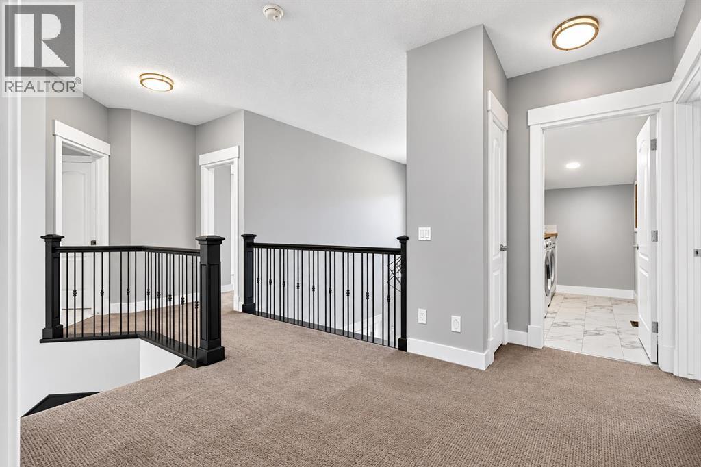 83 Discovery Ridge Boulevard SW, Calgary, Alberta  T2H 4Y2 - Photo 30 - A2350983