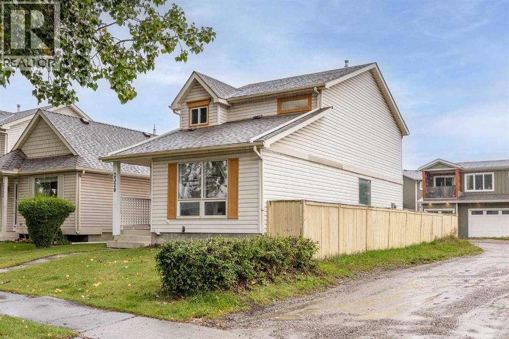 2320 Woodview Drive SW, Calgary, Alberta  T2W 4X6 - Photo 4 - A2345576