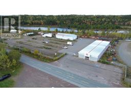 <div class="price">$1,050,000</div> 84-90 Main Street<br>Bishop's Falls, Newfoundland & Labrador<br>