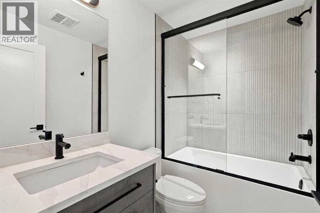 47 Woodbrook Road SW, Calgary, Alberta  T2W 4M5 - Photo 27 - A2350710