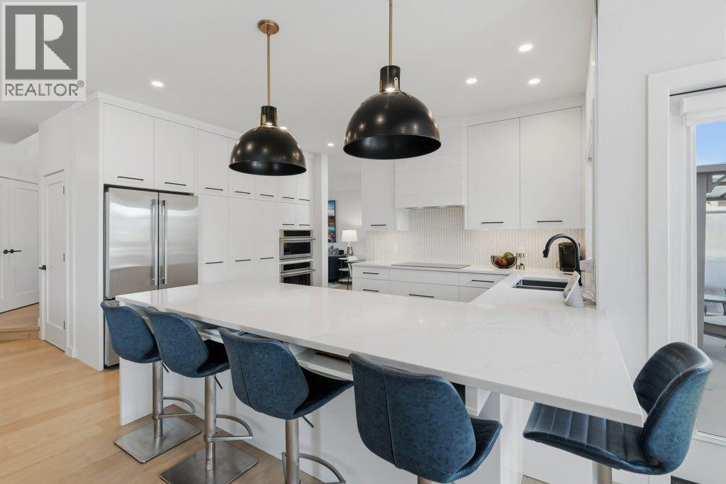 119 Woodpark Circle SW, Calgary, Alberta  T2W 6E9 - Photo 9 - A2351336