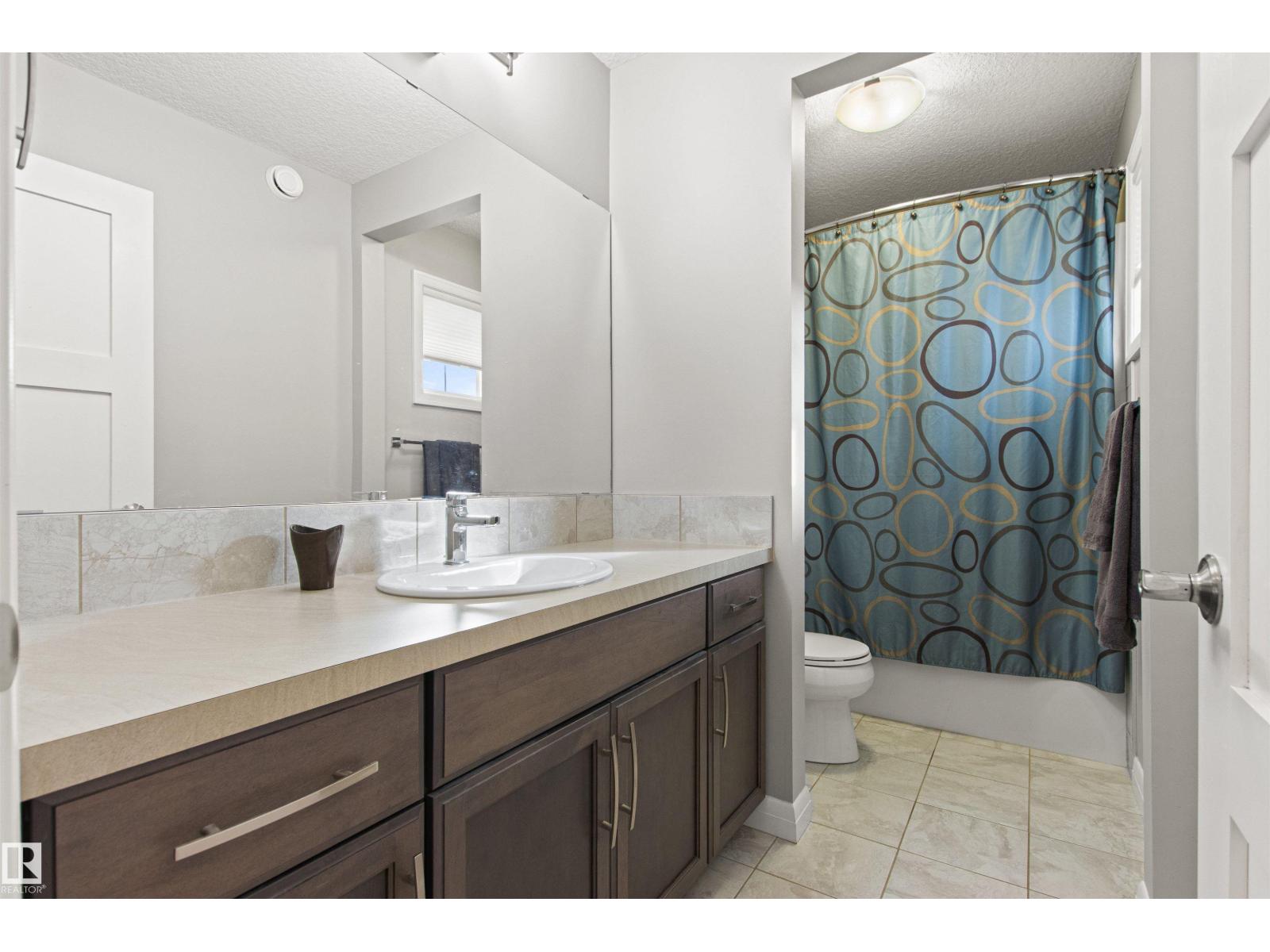 6124 175 AV NW