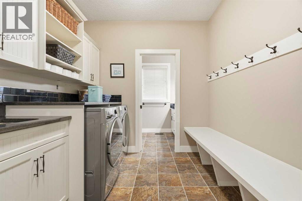 79 Hawk's Landing Drive, Priddis Greens, Alberta  T0L 1W3 - Photo 13 - A2349275
