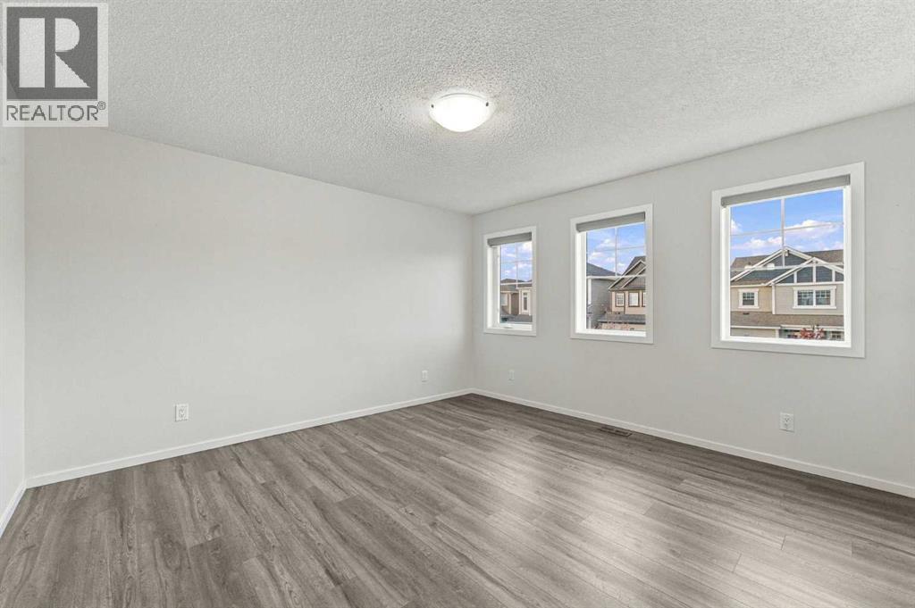 5006 Windsong Boulevard SW, Airdrie, Alberta  T4B 5L2 - Photo 17 - A2351500