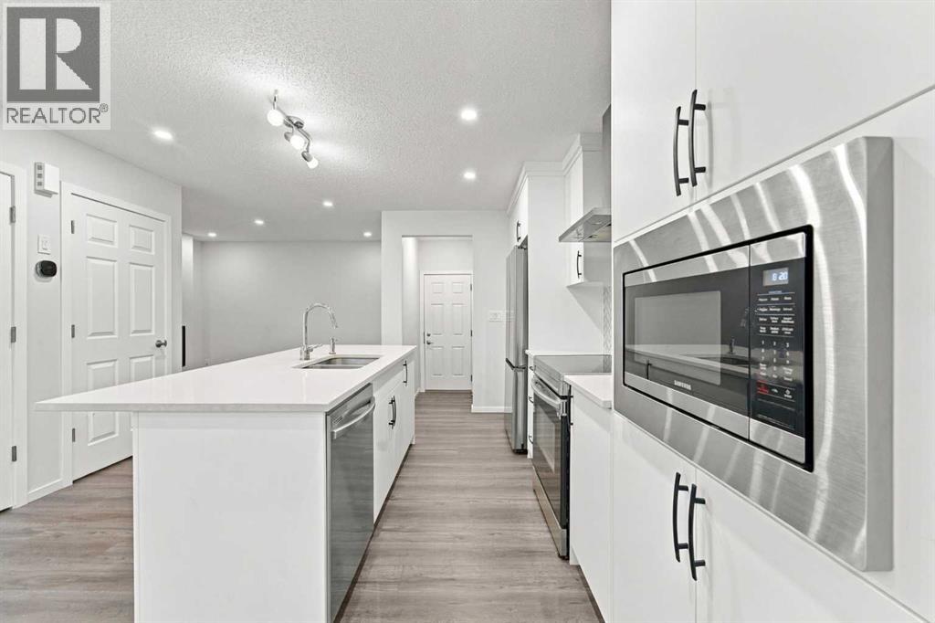 5006 Windsong Boulevard SW, Airdrie, Alberta  T4B 5L2 - Photo 8 - A2351500