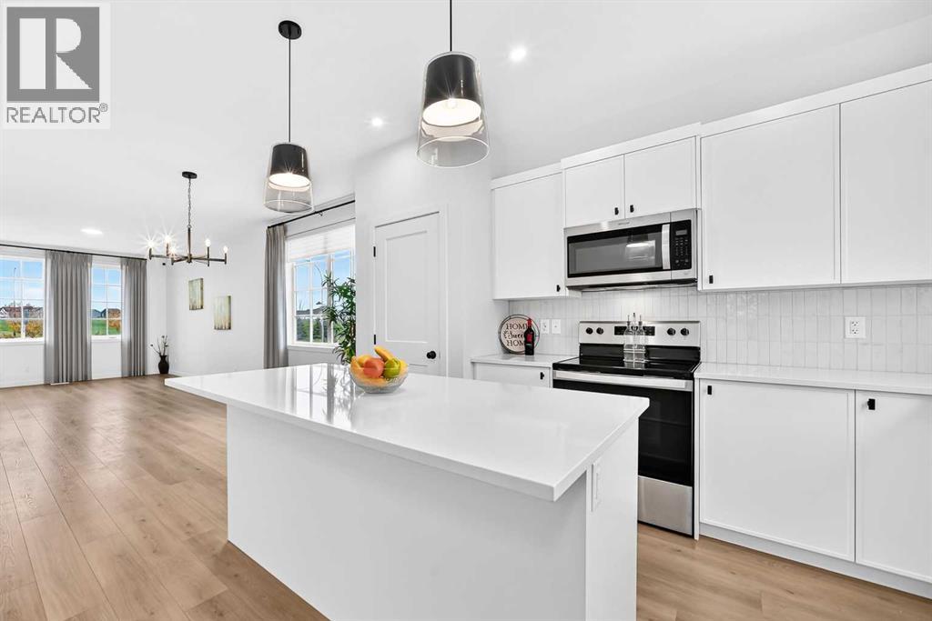 85 Heirloom Way SE, Calgary, Alberta  T3S 0H3 - Photo 2 - A2351429
