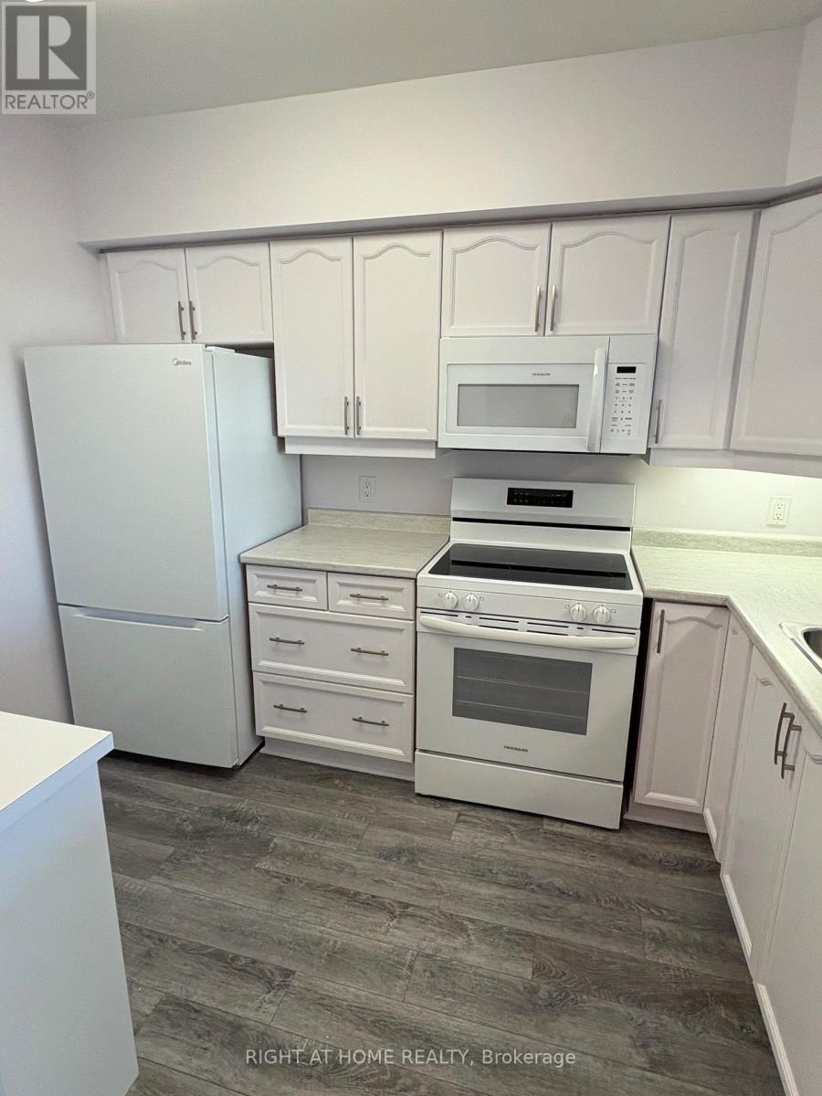 203 - 90 Dean Avenue, Barrie, Ontario L4N 0M3 - Photo 25 - S13881472