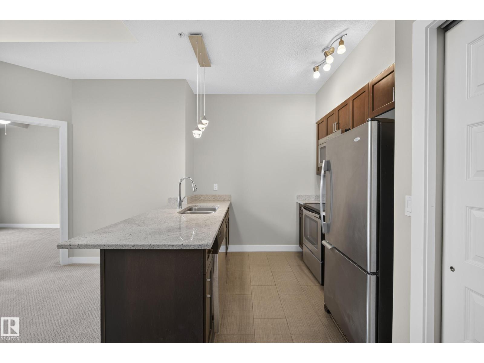 #505 1230 WINDERMERE WY SW
