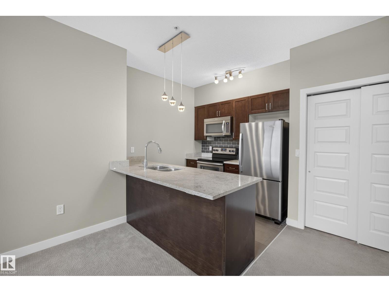 #505 1230 WINDERMERE WY SW