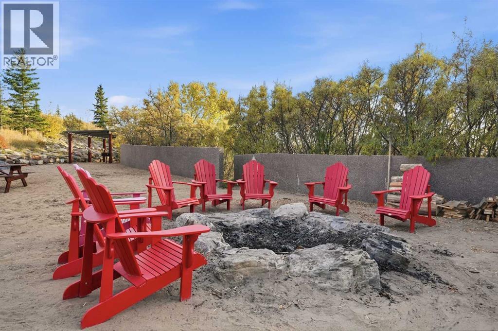 210 Cottageclub Crescent, Rural Rocky View County, Alberta  T4C 1B1 - Photo 33 - A2351102
