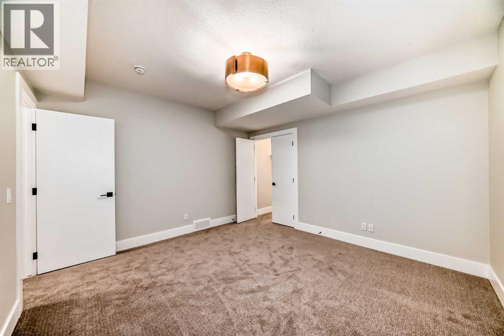 386 Spring Creek Circle Sw, Calgary, Alberta  T3H 6G4 - Photo 30 - A2351614