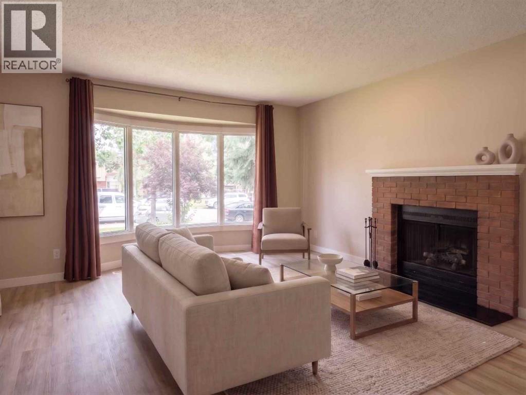 1095 Berkley Drive Nw, Calgary, Alberta  T3K 1S6 - Photo 5 - A2350547