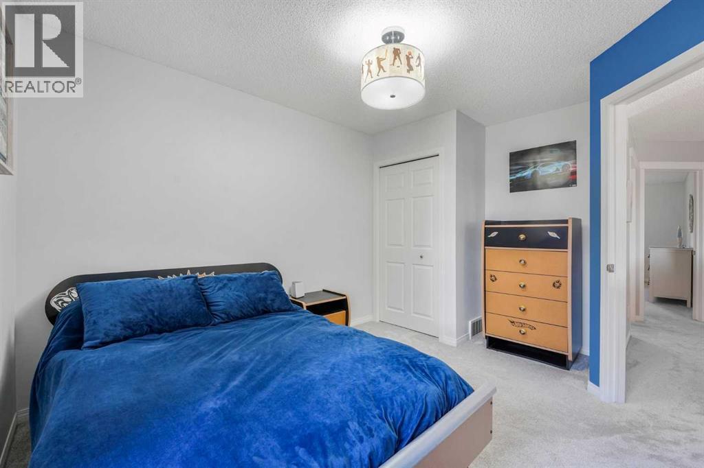 247 Crystal Shores Drive, Okotoks, Alberta  T1S 2C5 - Photo 30 - A2348514