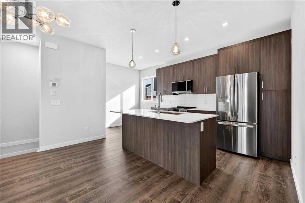 908, 132 Red Embers Link Ne, Calgary, Alberta T3N 2X8 - Photo 3 - A2294148