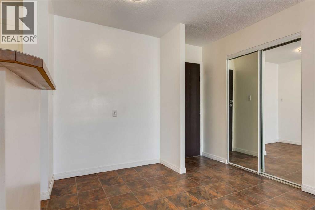 303, 715 15 Avenue SW
