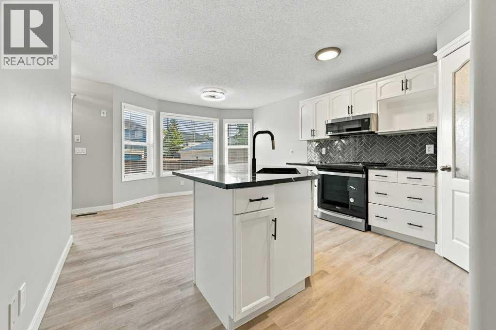 334 Bridlewood Court SW, Calgary, Alberta  T2Y 3T6 - Photo 6 - A2346203