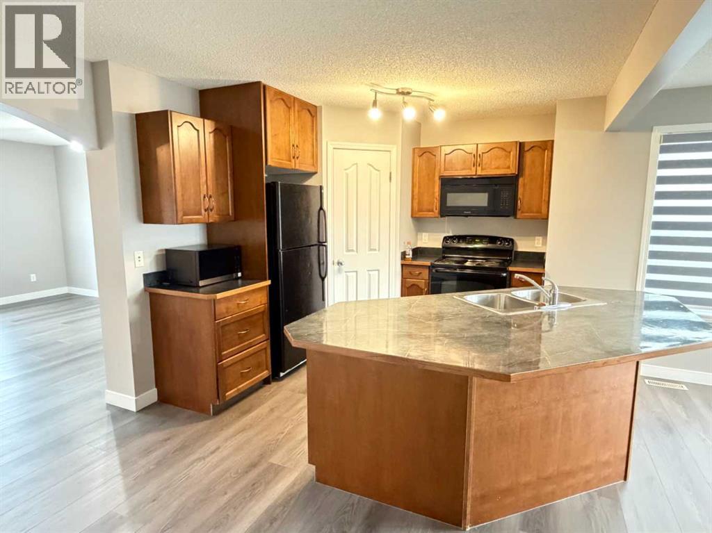 95 Panora Close NW, Calgary, Alberta  T3K 0G4 - Photo 14 - A2347756