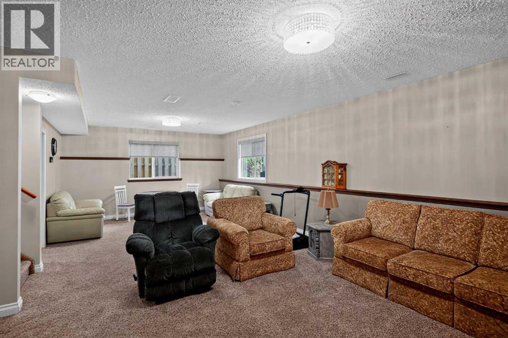 226 Cimarron Drive, Okotoks, Alberta  T1S 0A8 - Photo 26 - A2348164