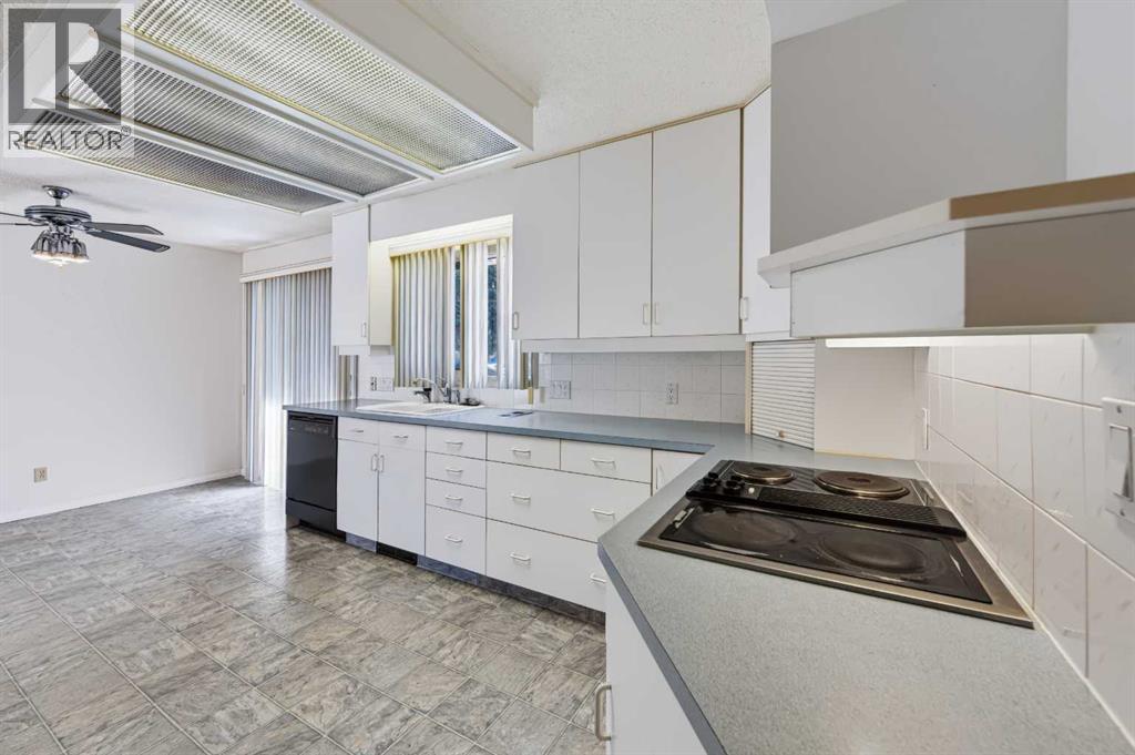 107 Hallbrook Drive SW, Calgary, Alberta  T2V 3H8 - Photo 17 - A2346389