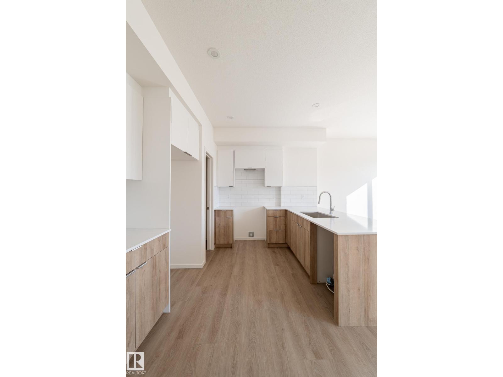 7694 174A AV NW