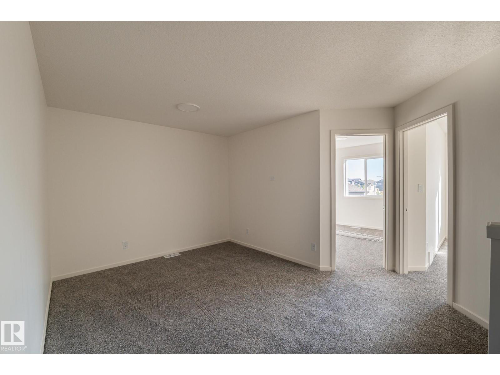 7694 174A AV NW