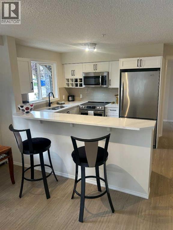 1112, 115 Prestwick Villas Se, Calgary, Alberta T2Z 0M8 - Photo 3 - A2349438
