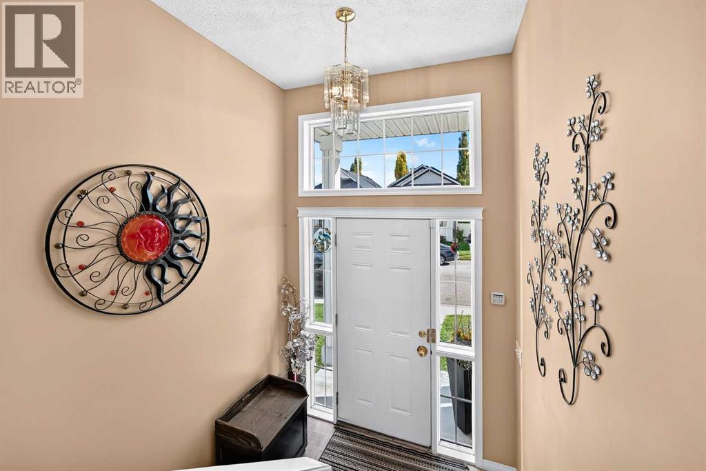 84 Tuscany Valley Drive Nw, Calgary, Alberta  T3L 2E7 - Photo 6 - A2349659