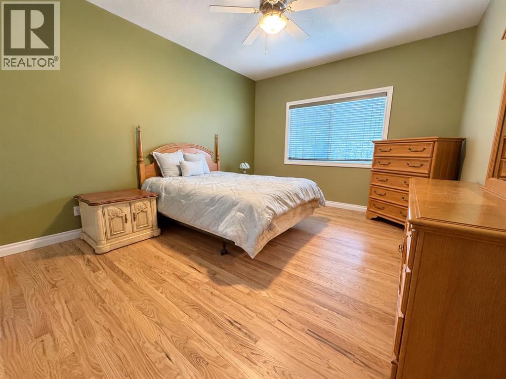 14 Cimarron Park Cove, Okotoks, Alberta  T1S 2L8 - Photo 11 - A2351836