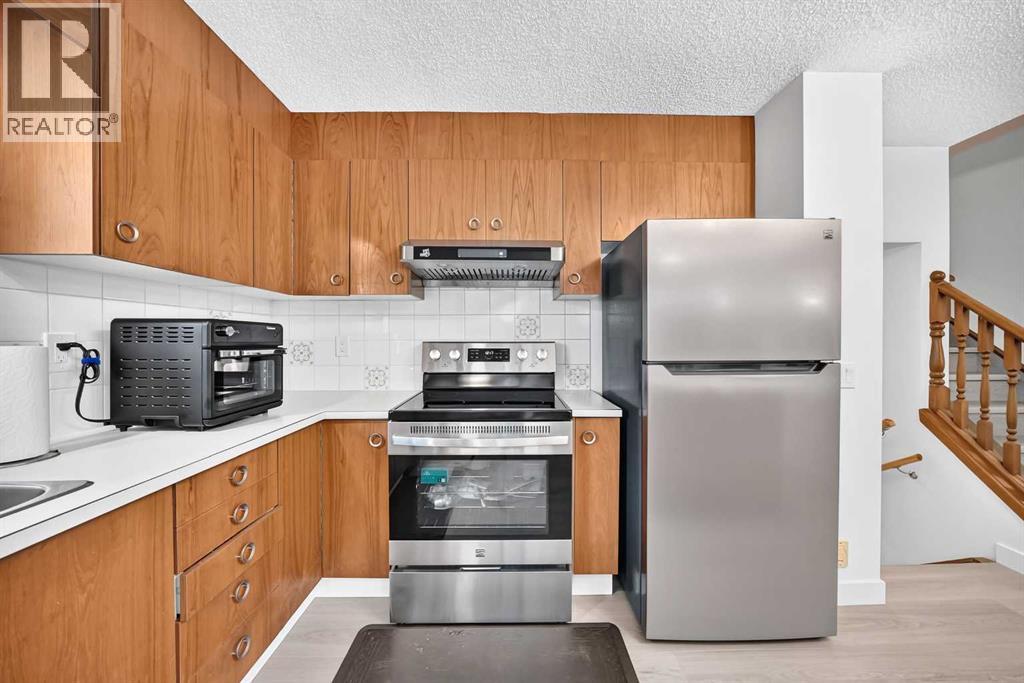 36 Berkshire Mews NW, Calgary, Alberta  T3K 1Z6 - Photo 8 - A2350222