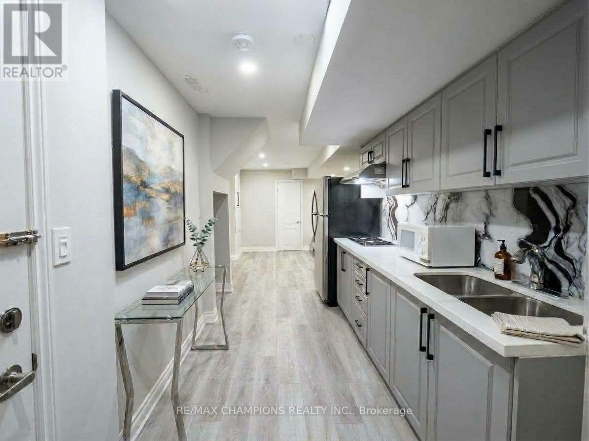 Bsmt-1 - 13 Black Diamond Crescent, Brampton, Ontario L6X 0V8 - Photo 2 - W13837896