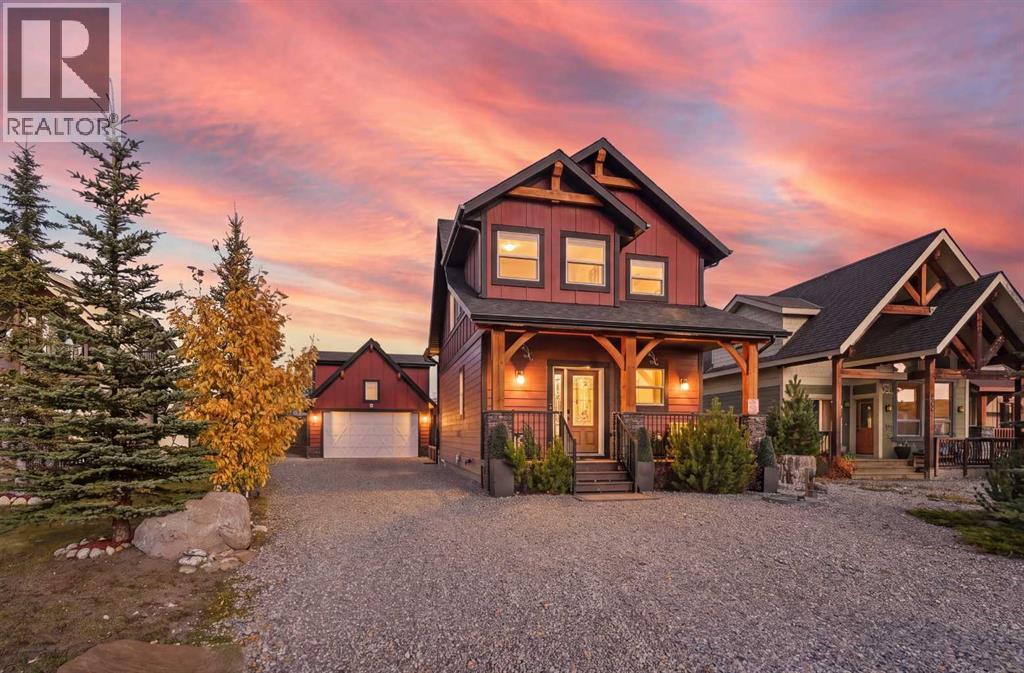210 Cottageclub Crescent, Rural Rocky View County, Alberta  T4C 1B1 - Photo 1 - A2351102