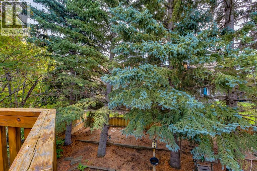 660 Coach Grove Road SW, Calgary, Alberta  T3H 1C6 - Photo 10 - A2339456