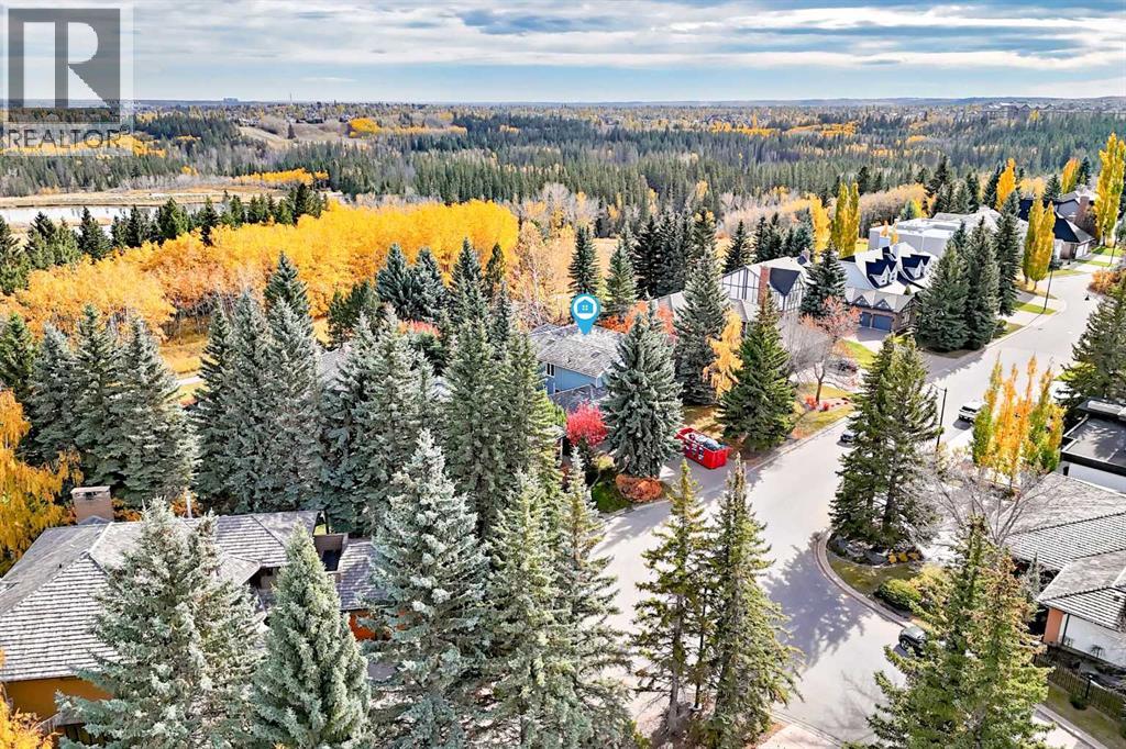 120 Woodacres Drive Sw, Calgary, Alberta  T2W 4Z8 - Photo 1 - A2351743
