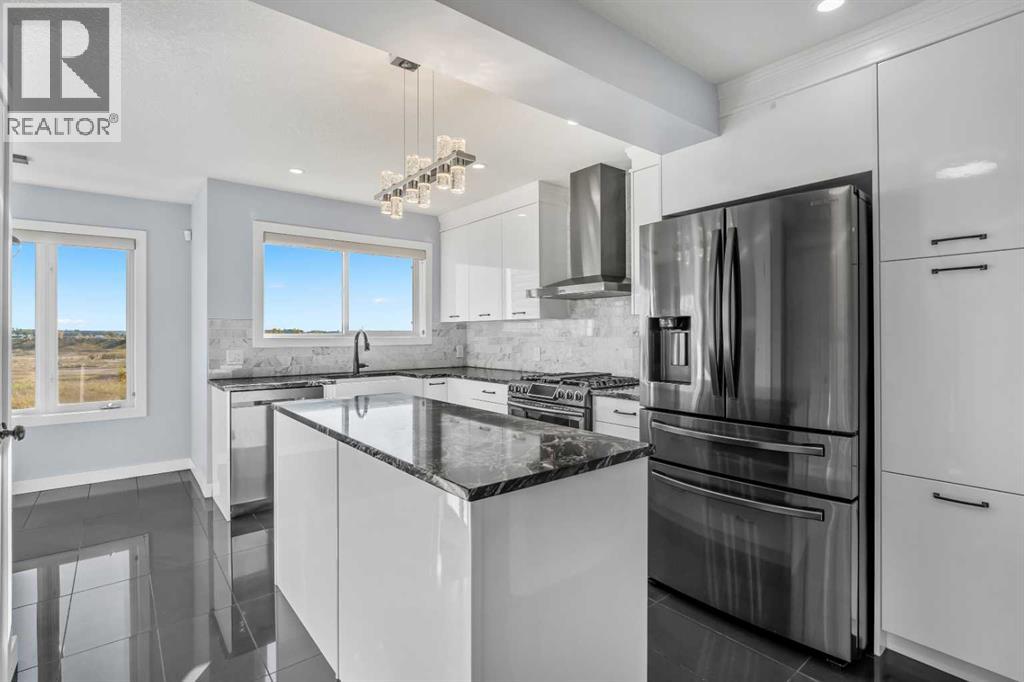 187 Covington Close NE, Calgary, Alberta  T3K 4L9 - Photo 4 - A2348715