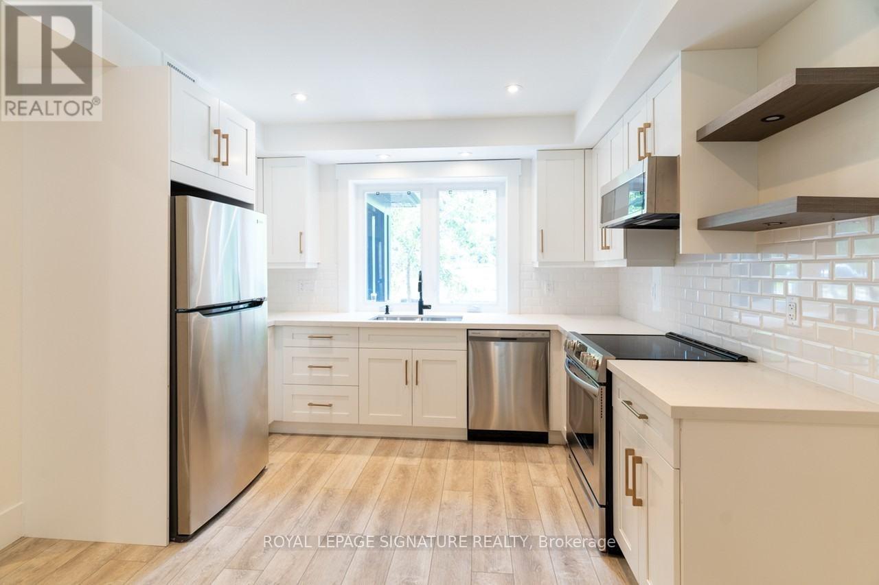 Main - 129 Kenilworth Avenue, Toronto, Ontario  M4L 3S7 - Photo 2 - E14018250