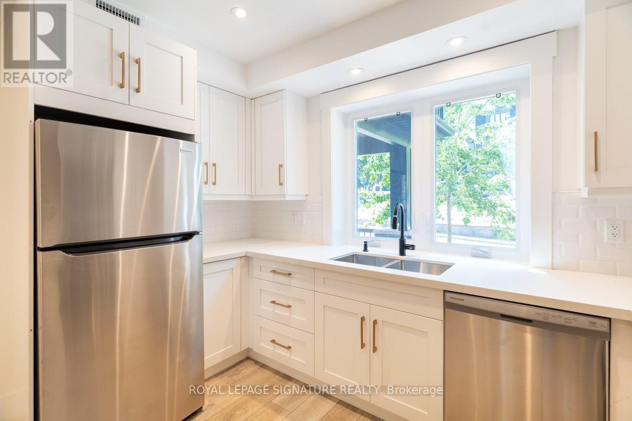Main - 129 Kenilworth Avenue, Toronto, Ontario  M4L 3S7 - Photo 3 - E14018250
