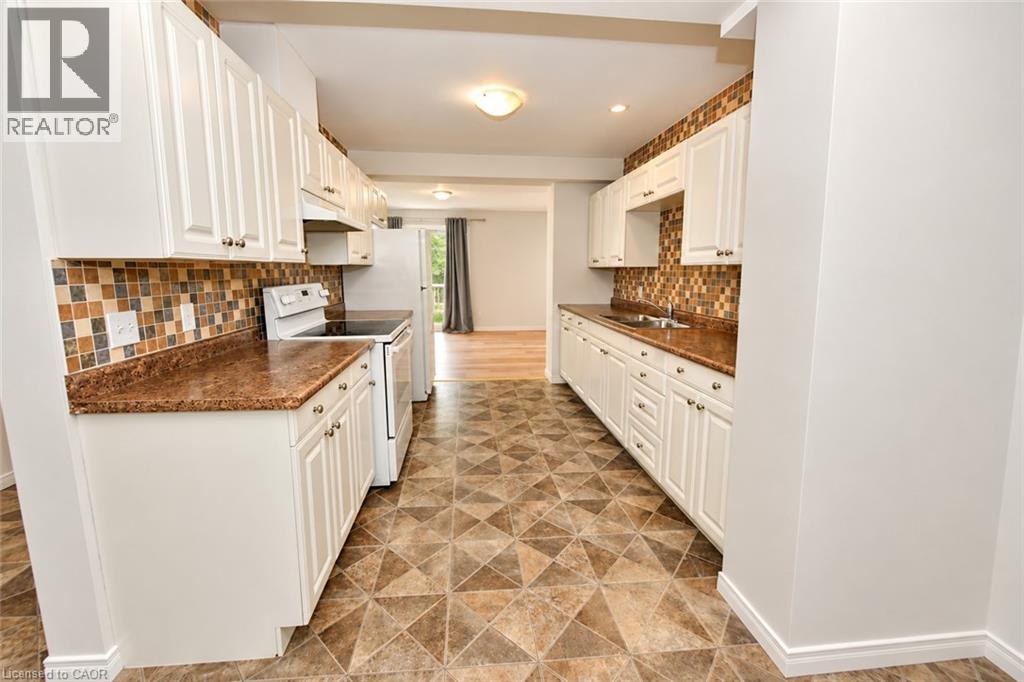 23 Howe Drive Unit# 8, Kitchener, Ontario  N2E 1J3 - Photo 4 - 40870298