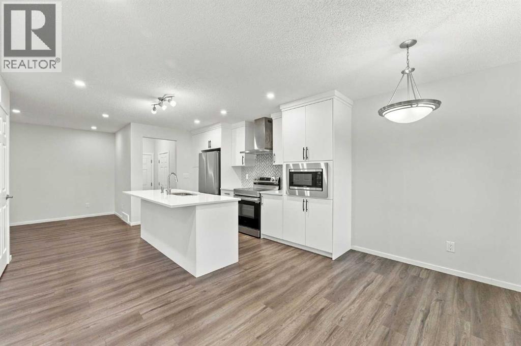 5006 Windsong Boulevard SW, Airdrie, Alberta  T4B 5L2 - Photo 6 - A2351500