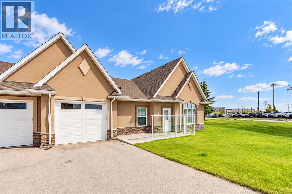 2, 20 River Heights View, Cochrane, Alberta  T4C 0M9 - Photo 3 - A2352056