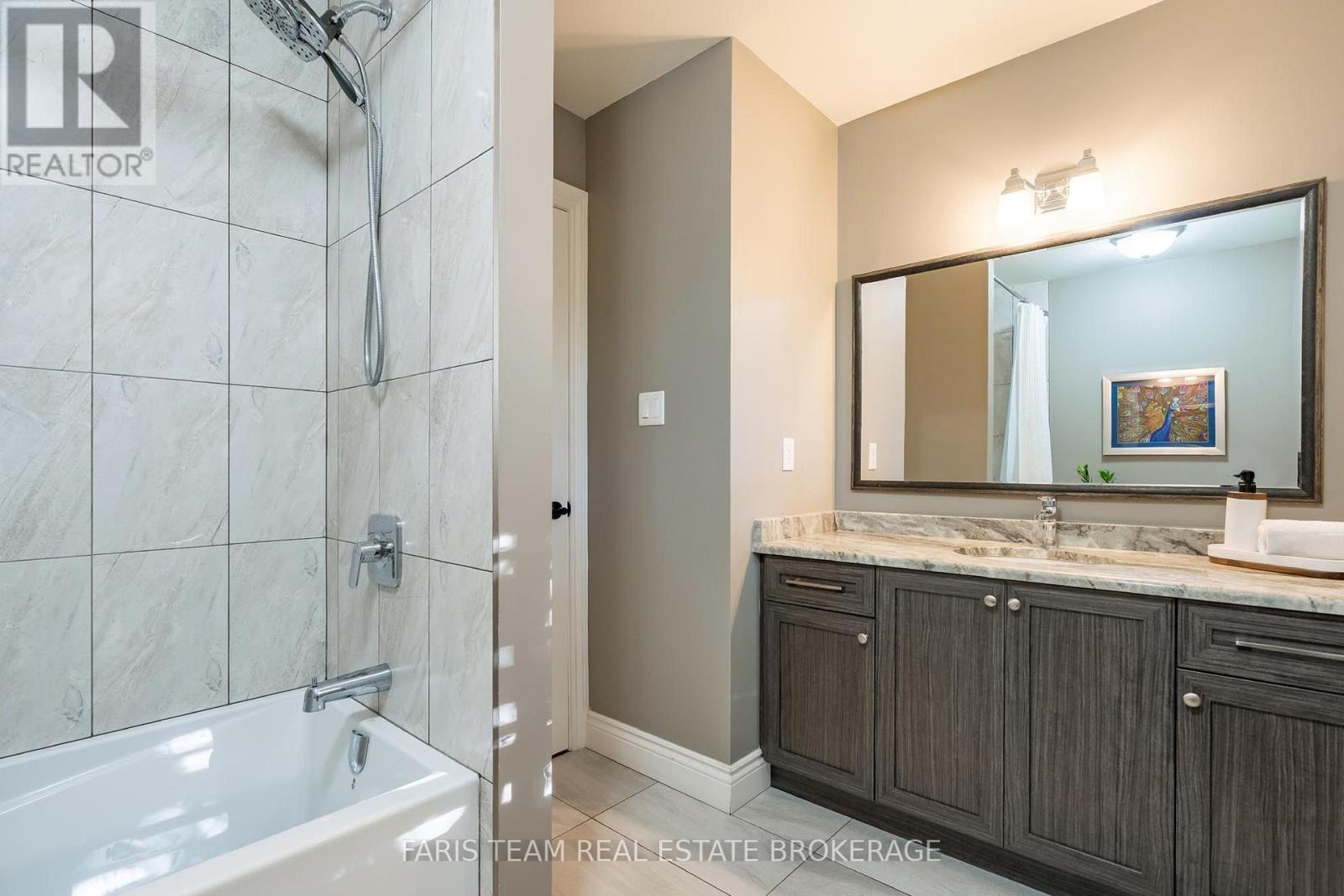 61 Oakridge Drive, Barrie (Sunnidale), Ontario  L4N 5N6 - Photo 18 - S14028252