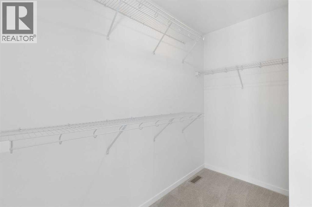 27 Creekstone Walk Sw, Calgary, Alberta  T2X 5M7 - Photo 31 - A2329207