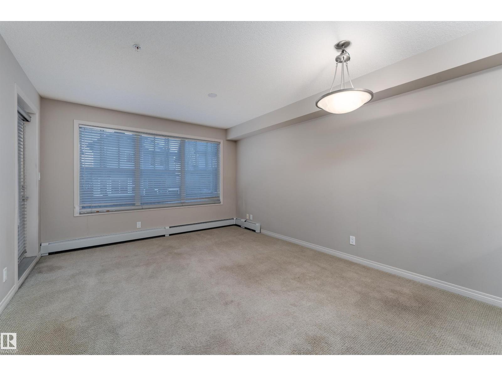 #202 105 AMBLESIDE DR SW