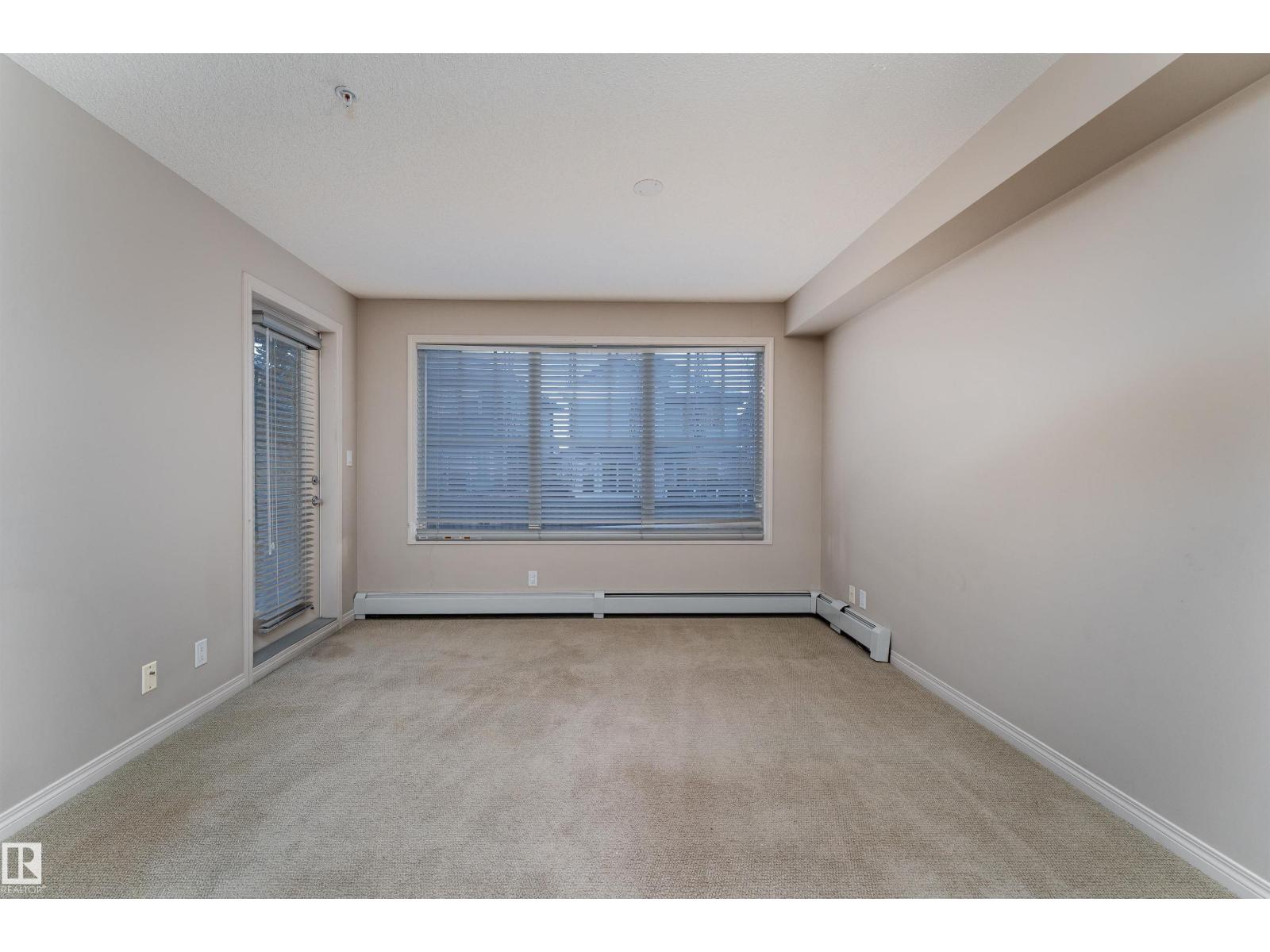 #202 105 AMBLESIDE DR SW