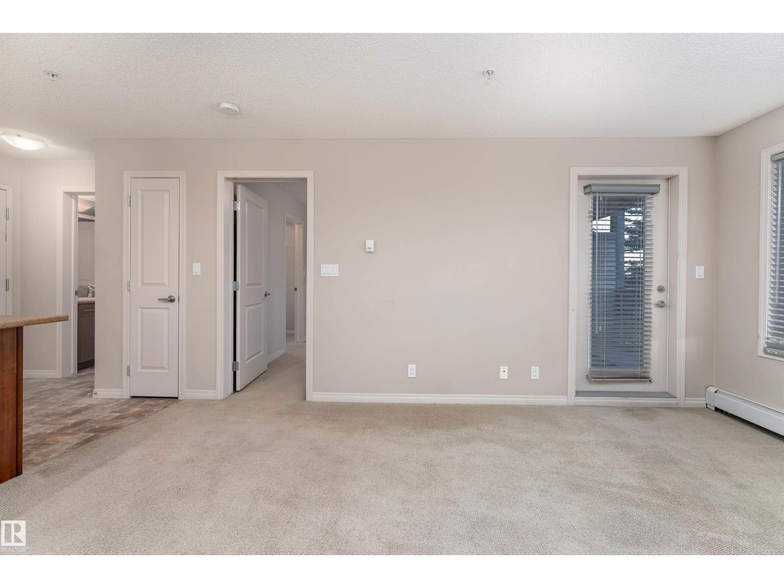 #202 105 AMBLESIDE DR SW