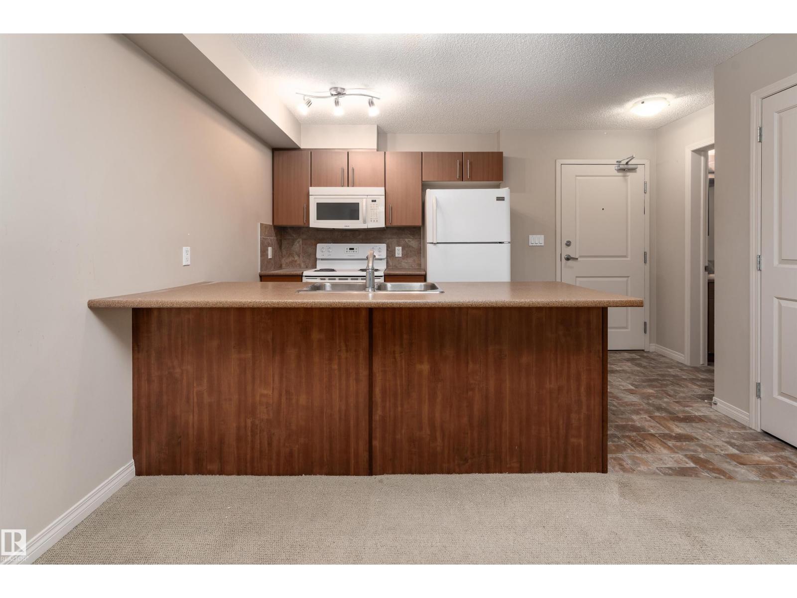 #202 105 AMBLESIDE DR SW